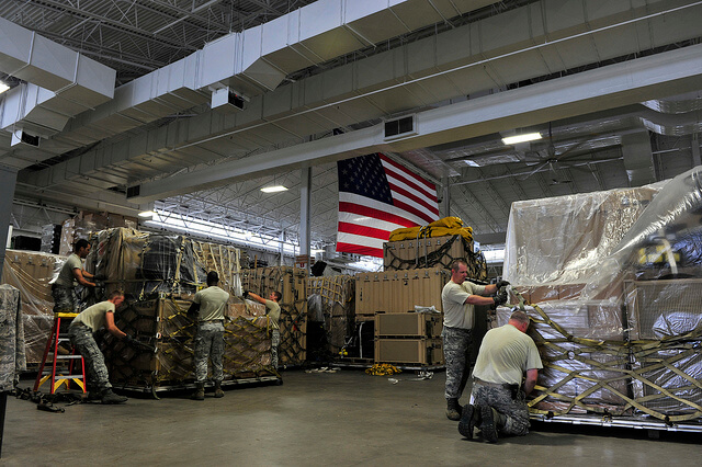 Airmen from the 621st Contingency Response Wing at Joint Base McGuire-Dix-Lakehurst, N.J., prepare emergency equipment for immediate response to Hurricane Irene at the CRW’s Global Reach Deployment Center here Aug. 25