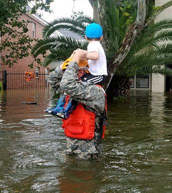 Texas National Guard soldiers arrive in Houston, Texas to aid citizens in heavily flooded areas from the storms of Hurricane Harvey